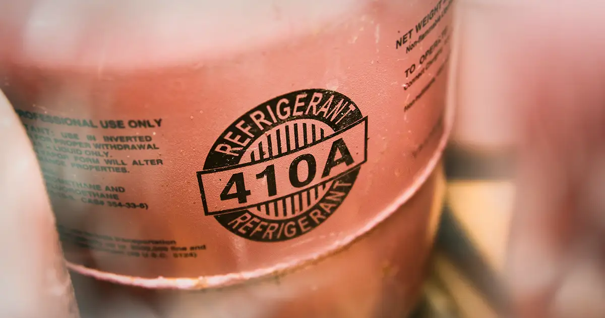 Closeup of a canister of 410A air conditioner refrigerant